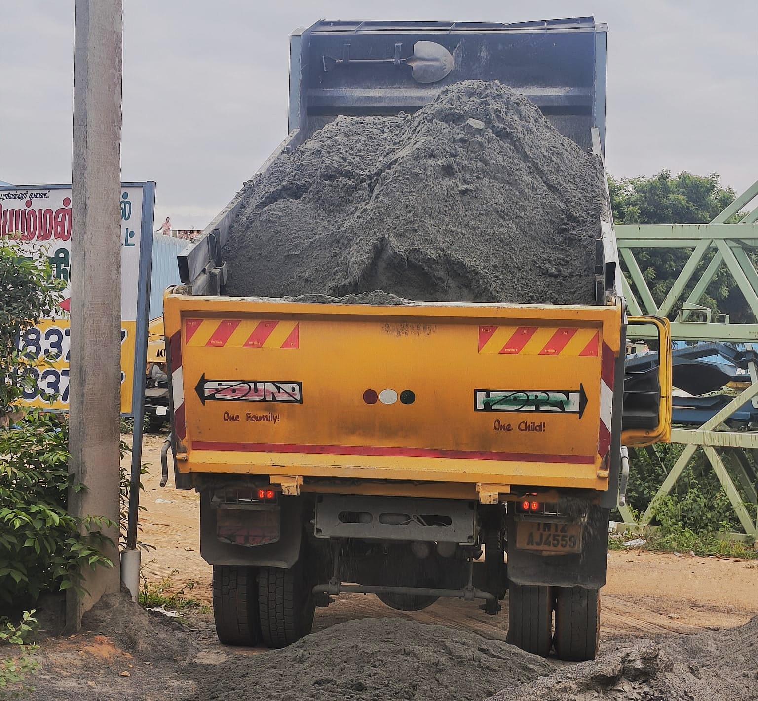 Truck unloading M-sand at a construction site in Chennai
